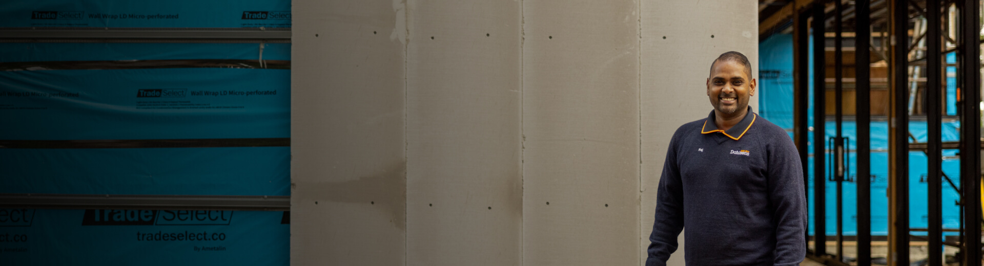 Photo of a man in a warehouse setting